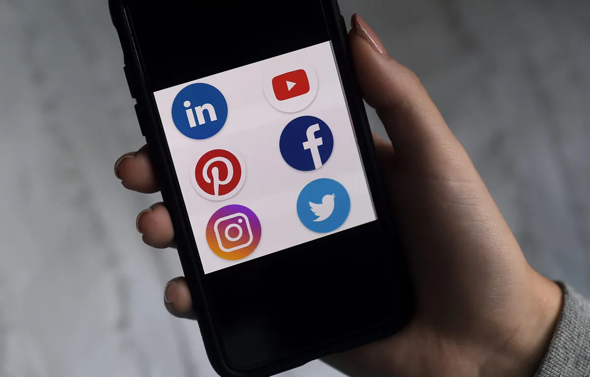 Social media apps are displayed on a smartphone on May 28, 2020. (Olivier Douliery/AFP via Getty Images)