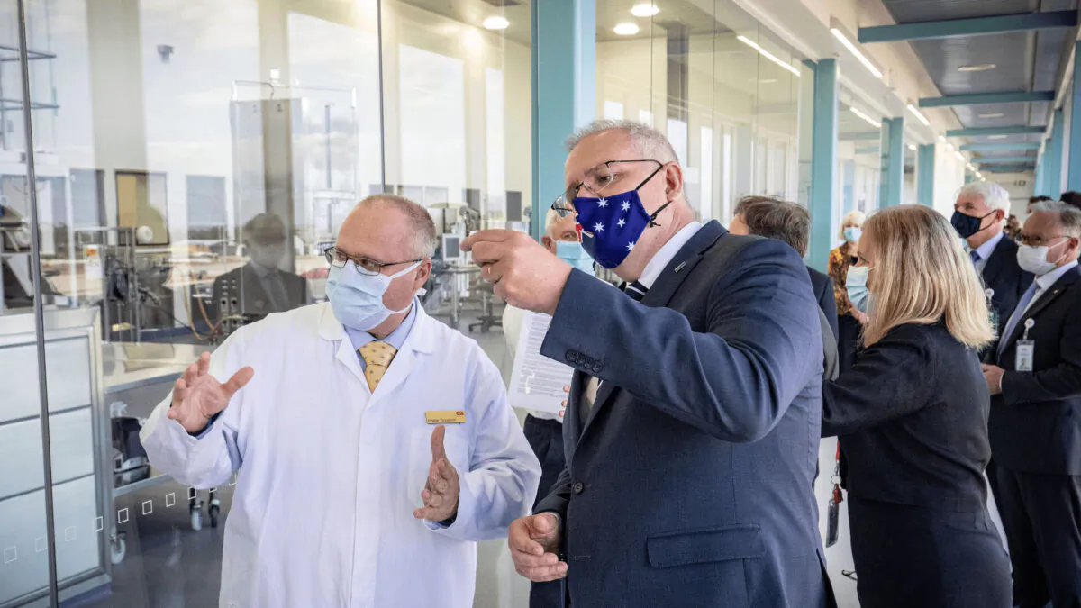 Prime Minister Scott Morrison being shown the CSL Lab where a COVID-19 Vaccine is being produced in Melbourne, Australia on November 16, 2020. (Darrian Traynor/Getty Images)