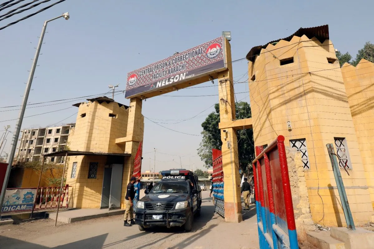 A police vehicle moves through the entrance of the Central Prison in Karachi, Pakistan, on Jan. 28, 2021. (Akhtar Soomro/Reuters)