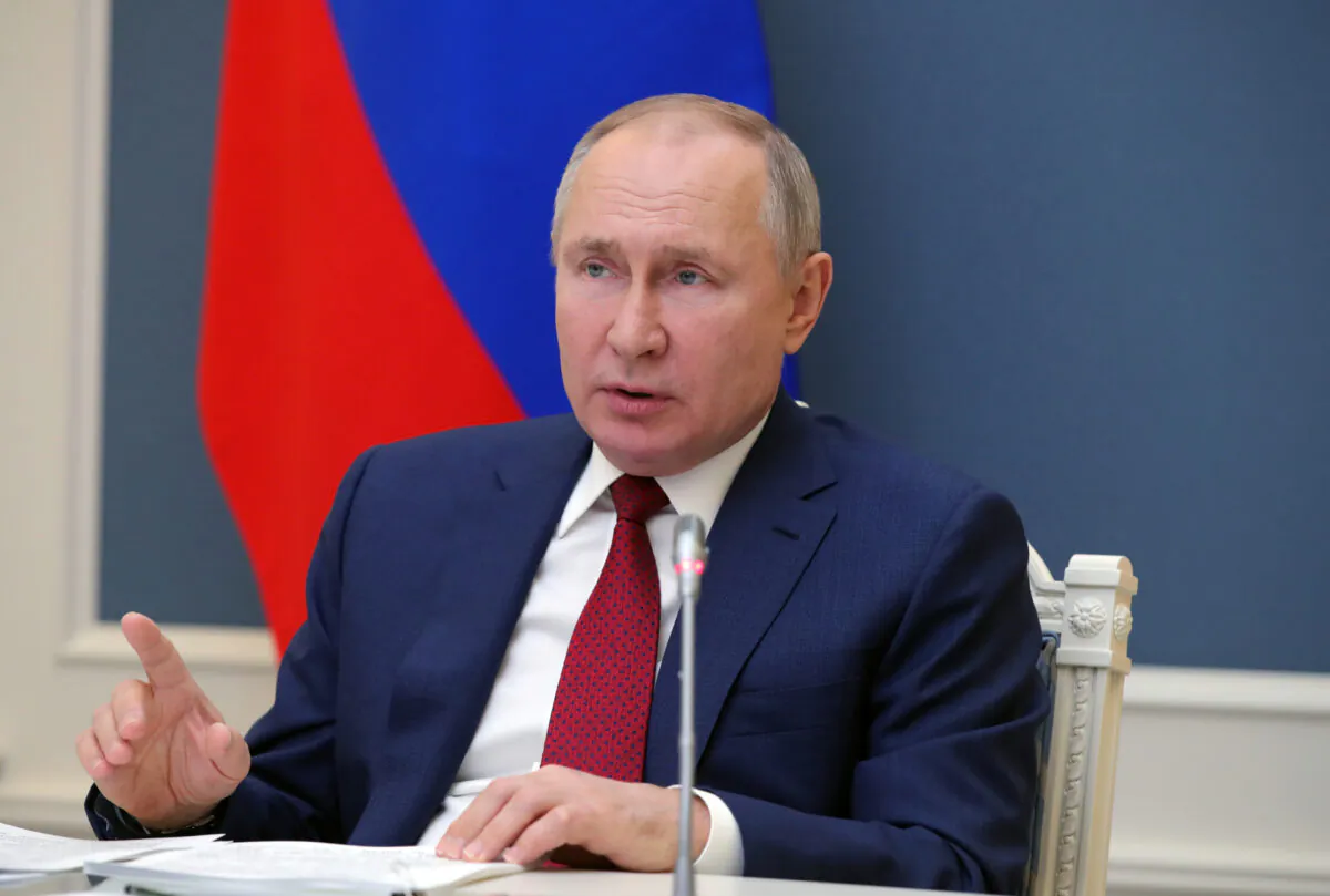 Russia's President Vladimir Putin attends a video conference during the World Economic Forum (WEF) of the Davos Agenda, in Moscow, Russia Jan. 27, 2021. (Sputnik/Mikhail Klimentyev/Kremlin via Reuters)