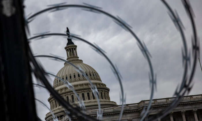 Razor wire installed on the fence surrounding the grounds of the Capitol in Washington on Jan. 15, 2021. (Samuel Corum/Getty Images)