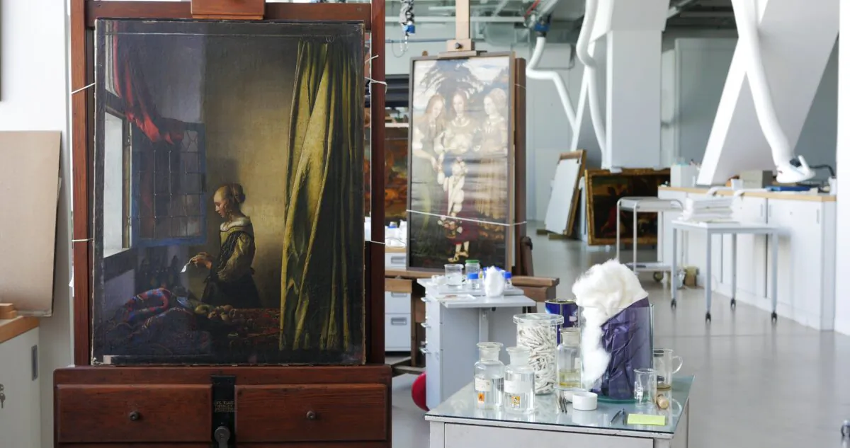 Johannes Vermeer's "Girl Reading a Letter at an Open Window," circa 1659, at the start of its restoration in the workshop of the Old Masters Picture Gallery, in Dresden, Germany. (Jürgen Lange/SKD)