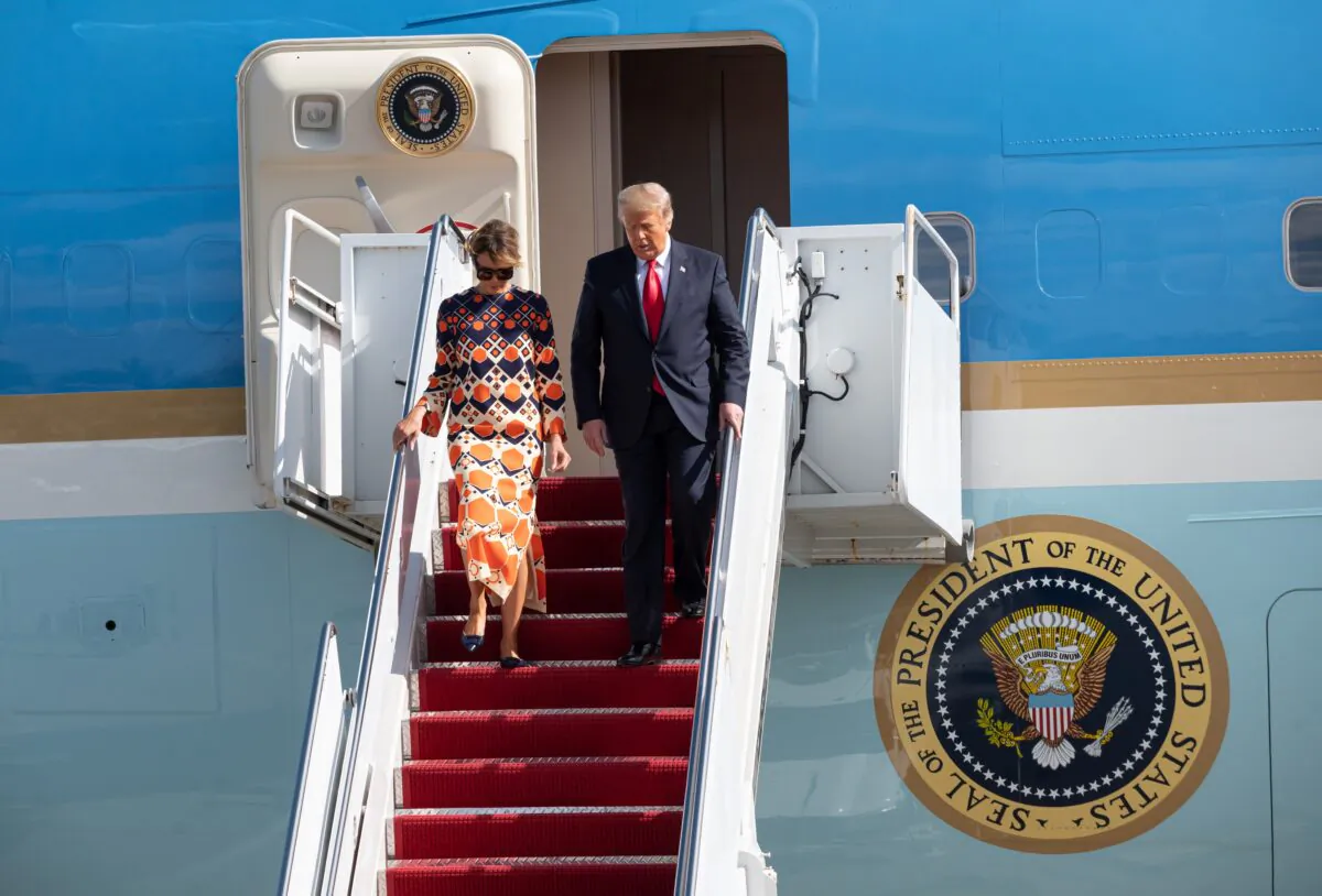 Outgoing President Donald Trump and First Lady Melania Trump exit Air Force One at the Palm Beach International Airport on the way to Mar-a-Lago in West Palm Beach, Fla., on Jan. 20, 2020. (Noam Galai/Getty Images)