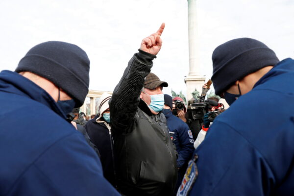 A man gestures during a demonstration