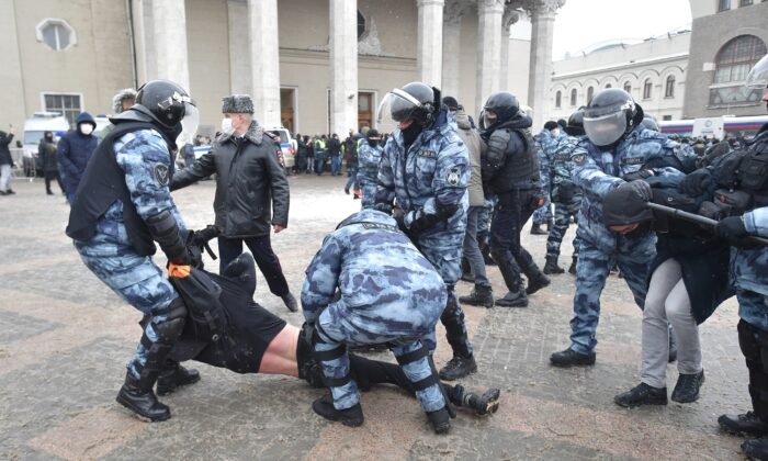 Police detain protesters during a protest against the jailing of opposition leader Alexei Navalny in Moscow, on Jan. 31, 2021. (Dmitry Serebryakov/AP Photo)