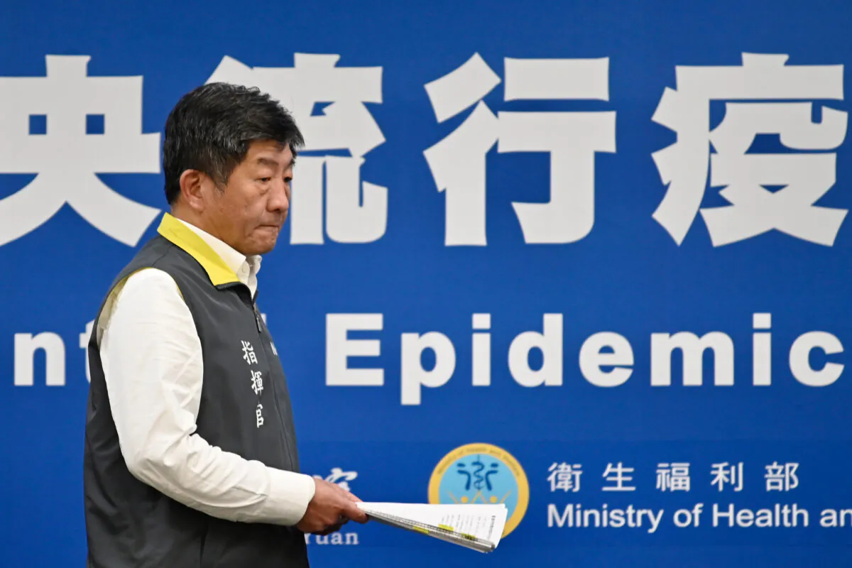 Taiwan's Minister of Health and Welfare Chen Shih-chung arrives at a press conference at the headquarters of the Centers for Disease Control in Taipei on March 11, 2020. (Sam Yeh/AFP via Getty Images)