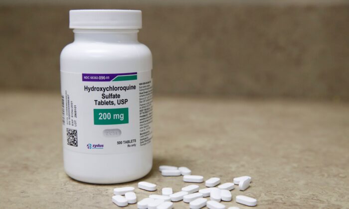 A bottle and pills of Hydroxychloroquine sit on a counter at Rock Canyon Pharmacy in Provo, Utah, on May 20, 2020. (George Frey/AFP via Getty Images)