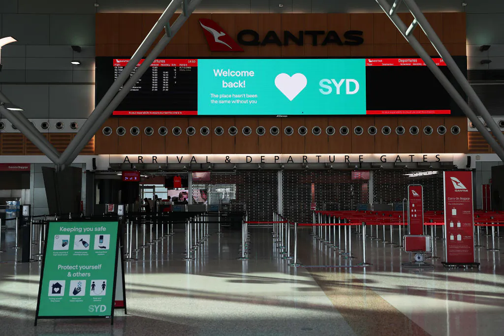 Welcome Back signage is seen at Sydney domestic airport on July 2, 2020. (Mark Metcalfe/Getty Images)