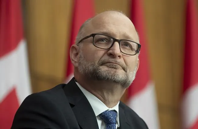 Justice Minister David Lametti at a news conference in Ottawa, on November 26, 2020. Lametti isn't ruling out the possibility of asking the Supreme Court to advise on the constitutionality of a bill to expand access to medical assistance in dying. (Adrian Wyld/The Canadian Press)