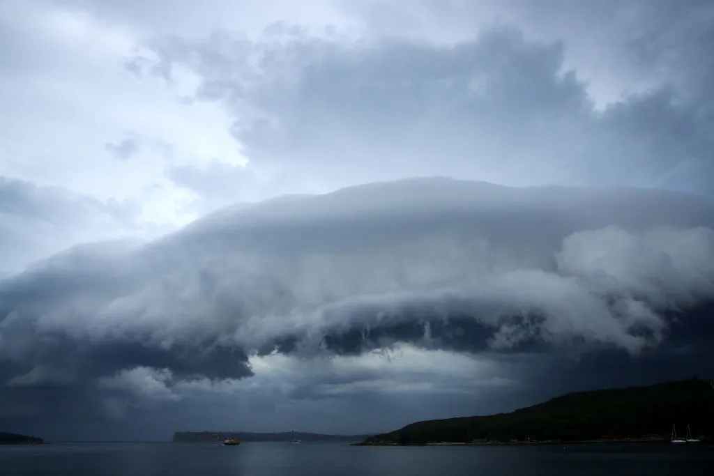 A Manly ferry passes Sydney Heads as a storm front crosses Sydney Harbour on January 9, 2018 in Sydney, Australia.(Cameron Spencer/Getty Images)