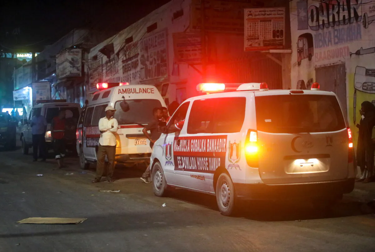 Ambulances are seen near the scene of a car bomb explosion in the Kilometre 4 area of Mogadishu, Somalia, on Jan. 31, 2021. (Feisal Omar/Reuters)