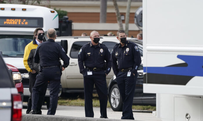 Law enforcement officers block an area where a shooting wounded several FBI while serving an arrest warrant in Sunrise, Fla., on Feb. 2, 2021. (Marta Lavandier/AP Photo)