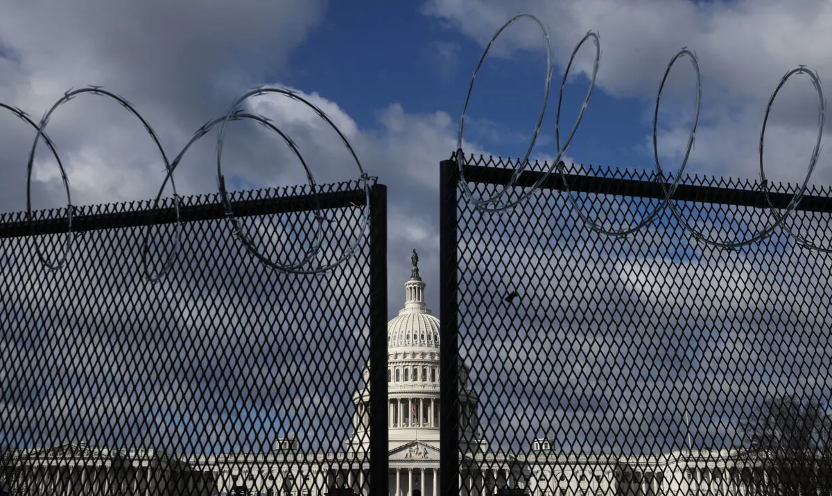 An 8-foot-tall steel fence topped with concertina razor wire circles the U.S. Capitol in Washington on Jan. 29, 2021. (Chip Somodevilla/Getty Images)
