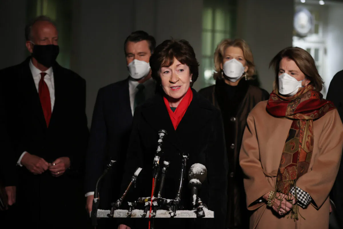 Sen. Susan Collins (R-ME) speaks to reporters as (L-R) Rep. Jerry Moran (R-KS), Rep. Todd Young (R-IN), Sen. Lisa Murkwoski (R-AK) and Sen. Shelley Moore Capito (R-WV) after meeting with President Joe Biden and Vice President Kamala Harris in the Oval Office at the White House in Washington on Feb. 1, 2021. (Chip Somodevilla/Getty Images)