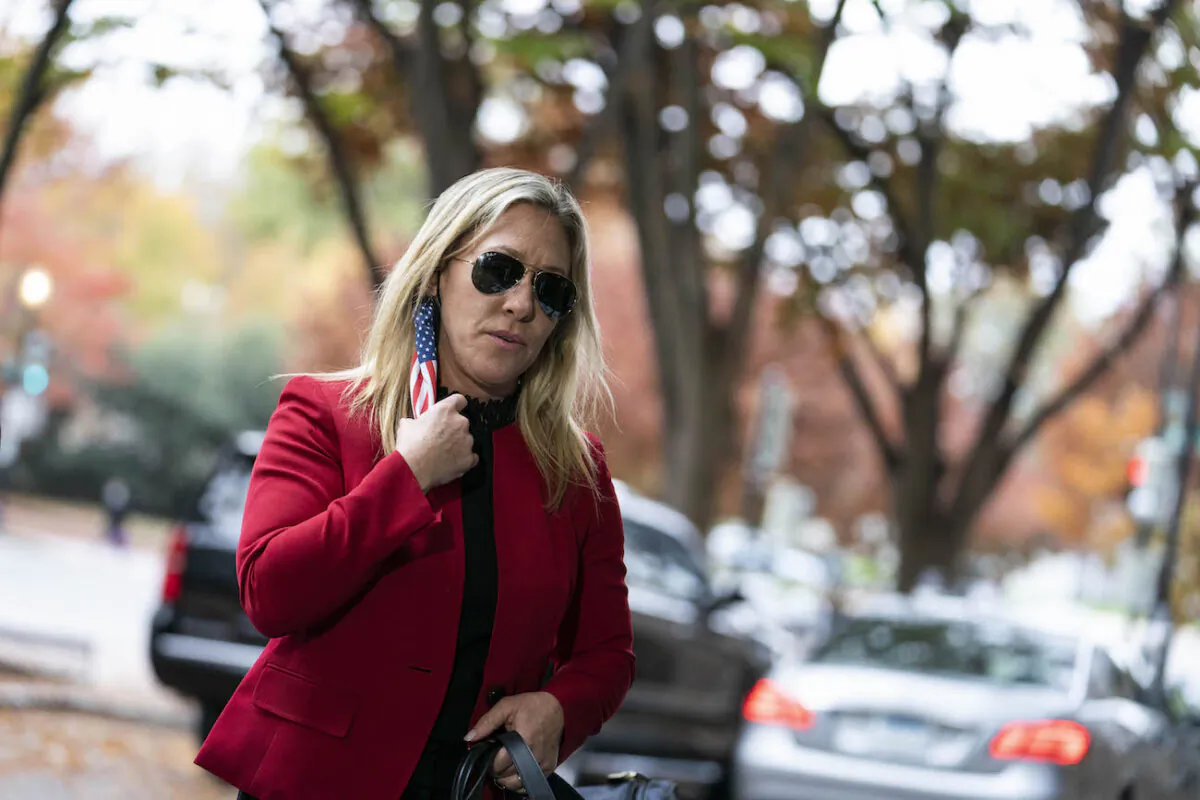 Rep. Marjorie Taylor Greene (R-Ga.) arrives to the Hyatt Regency hotel on Capitol Hill in Washington on Nov. 12, 2020. (Sarah Silbiger/Getty Images)