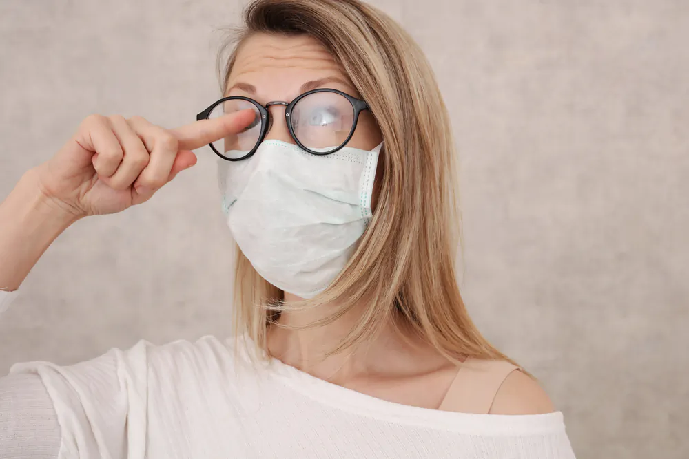 Glasses fogging up while wearing a mask makes it difficult, if not impossible, to see. (Albina Gavrilovic/Shutterstock)