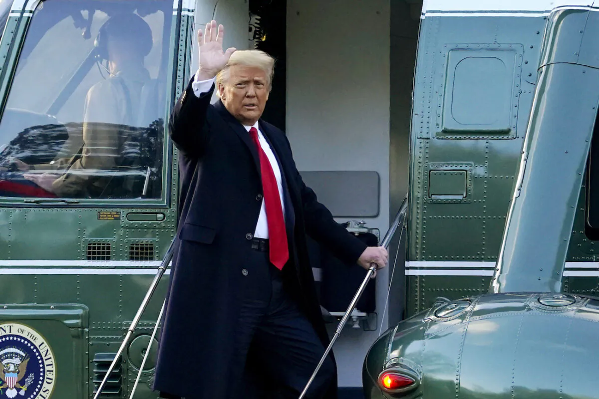 President Donald Trump waves as he boards Marine One on the South Lawn of the White House on Jan. 20, 2021. (Alex Brandon/AP Photo)