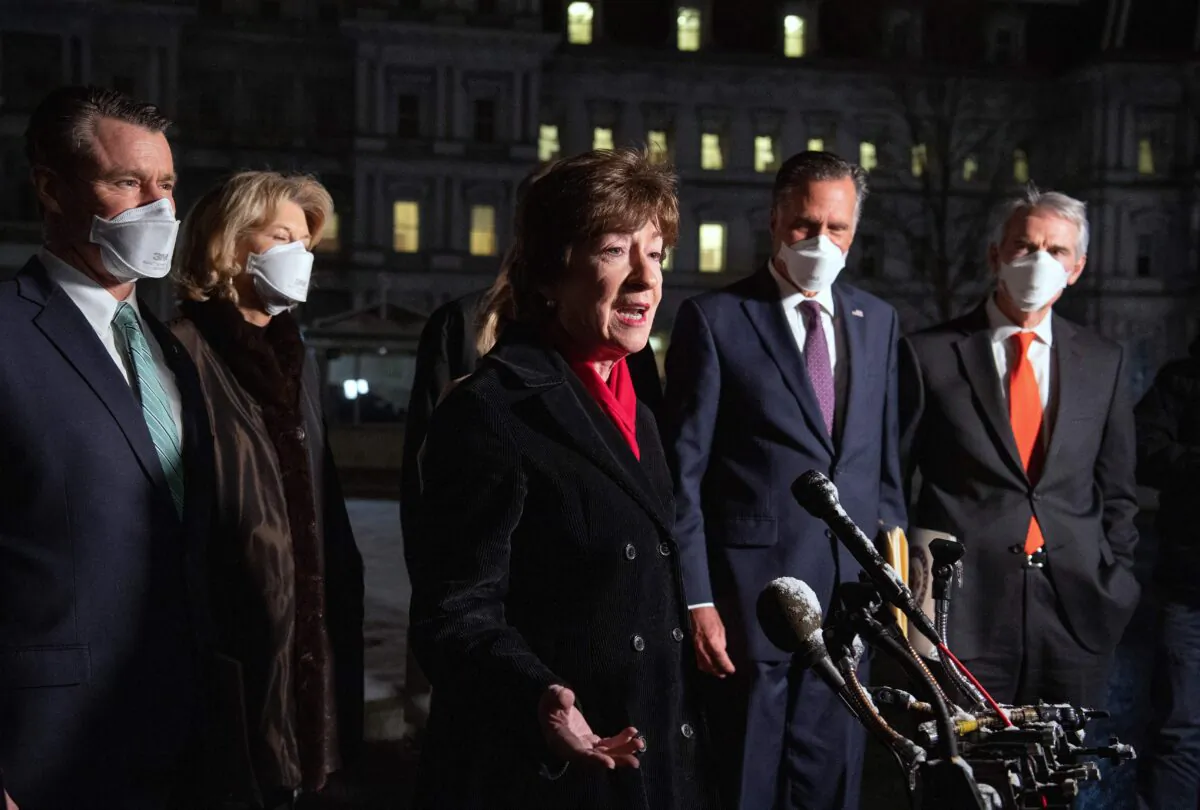 Senator Susan Collins (R-Maine), speaks alongside (L–R) Sens. Todd Young (R-Ind.), Lisa Murkowski (R-Alaska), Mitt Romney (R-Utah) and Rob Portman (R-Ohio), after a meeting with US President Joe Biden about a COVID relief bill, outside of the West Wing of the White House on Feb. 1, 2021. (SAUL LOEB/AFP via Getty Images)