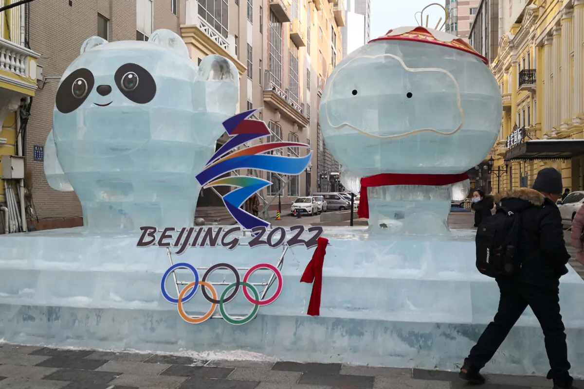 An ice sculpture of mascots for the 2022 Beijing Winter Olympics and Paralympic Games on a street in Harbin, a city in northeastern China's Heilongjiang Province, on Dec. 28, 2020. (STR/AFP via Getty Images)