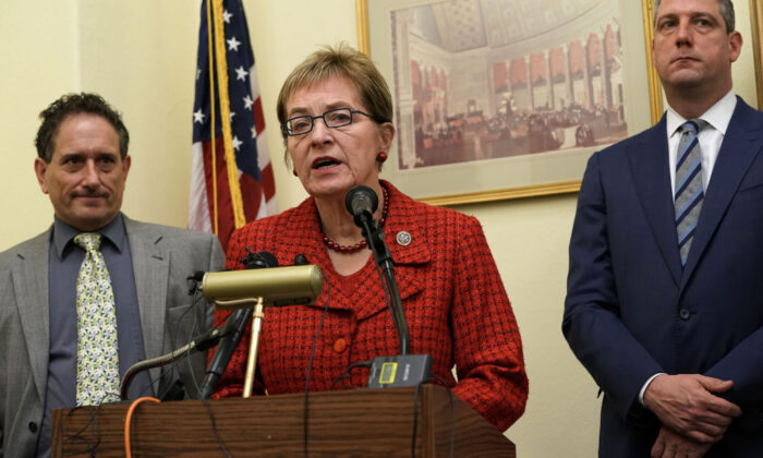 Rep. Marcy Kaptur (D-Ohio) speaks as then Rep.-elect Andy Levin (D-Mich.) (L), and Rep. Tim Ryan (D-Ohio) (R) listen during a news conference in Washington, on Nov. 29, 2018. (Alex Wong/Getty Images)