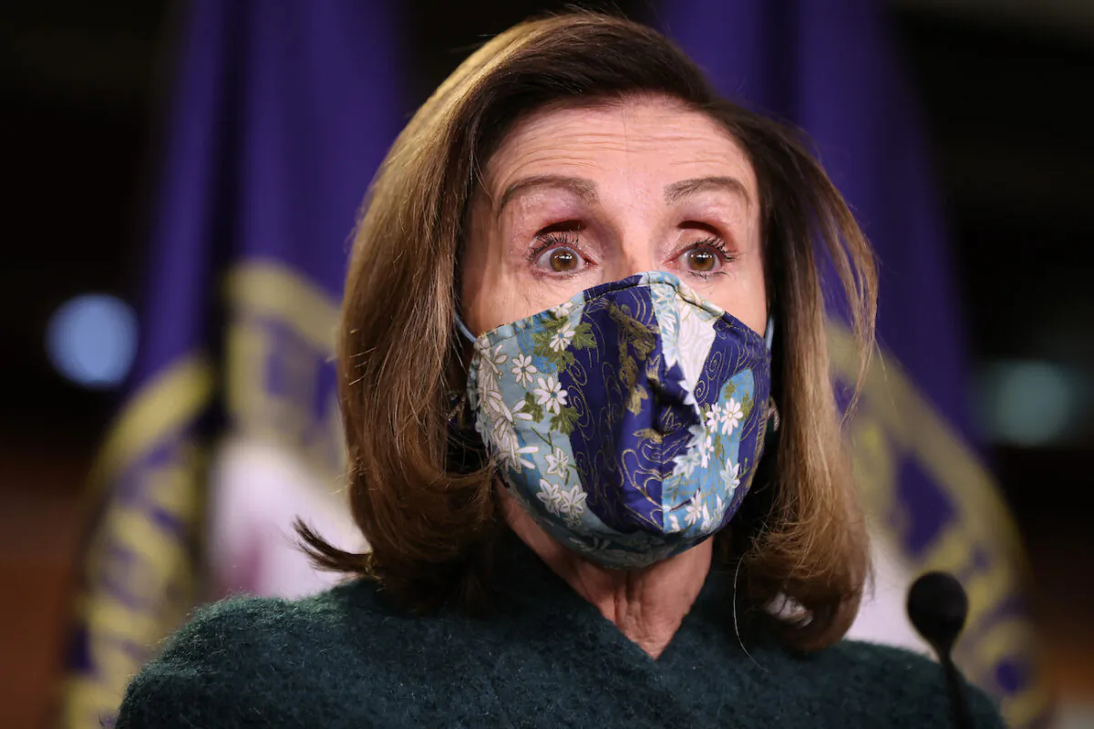 House Speaker Nancy Pelosi (D-Calif.) holds her weekly news conference in the U.S. Capitol Visitors Center in Washington on Jan. 28, 2021. (Chip Somodevilla/Getty Images)