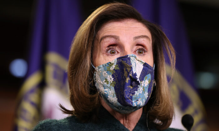 House Speaker Nancy Pelosi (D-Calif.) holds her weekly news conference in the U.S. Capitol Visitors Center in Washington on Jan. 28, 2021. (Chip Somodevilla/Getty Images)