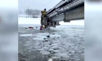 Rescuers Brave Cracking Ice to Pull Two From Sinking Truck
