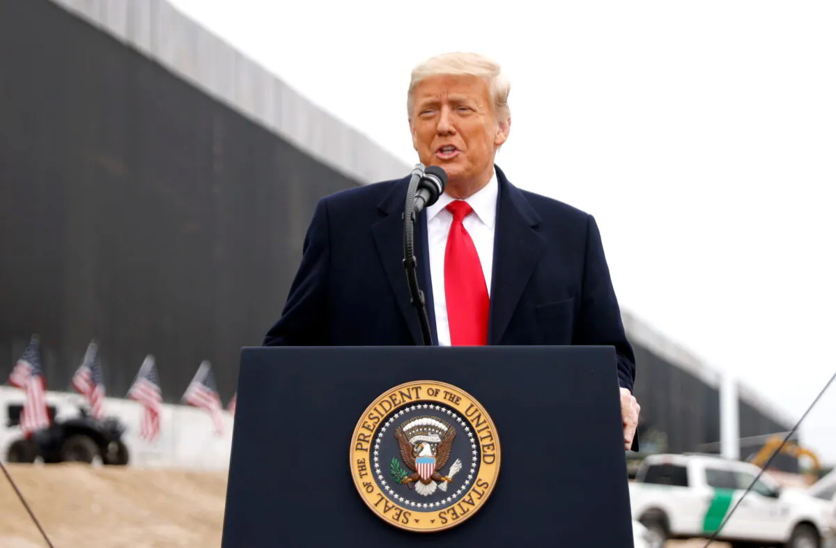 Former President Donald Trump speaks during a visit at the U.S.-Mexico border wall, in Alamo, Texas, on Jan. 12, 2021. (Carlos Barria/Reuters)