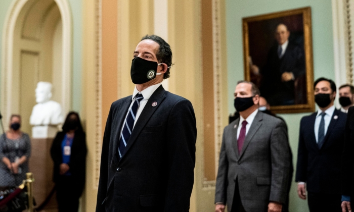 Rep. Jamie Raskin (D-Md.) leads other House impeachment managers in delivering to the Senate an article of impeachment against former President Donald Trump, in Washington, on Jan. 25, 2021. (Melina Mara/Pool/AFP via Getty Images)