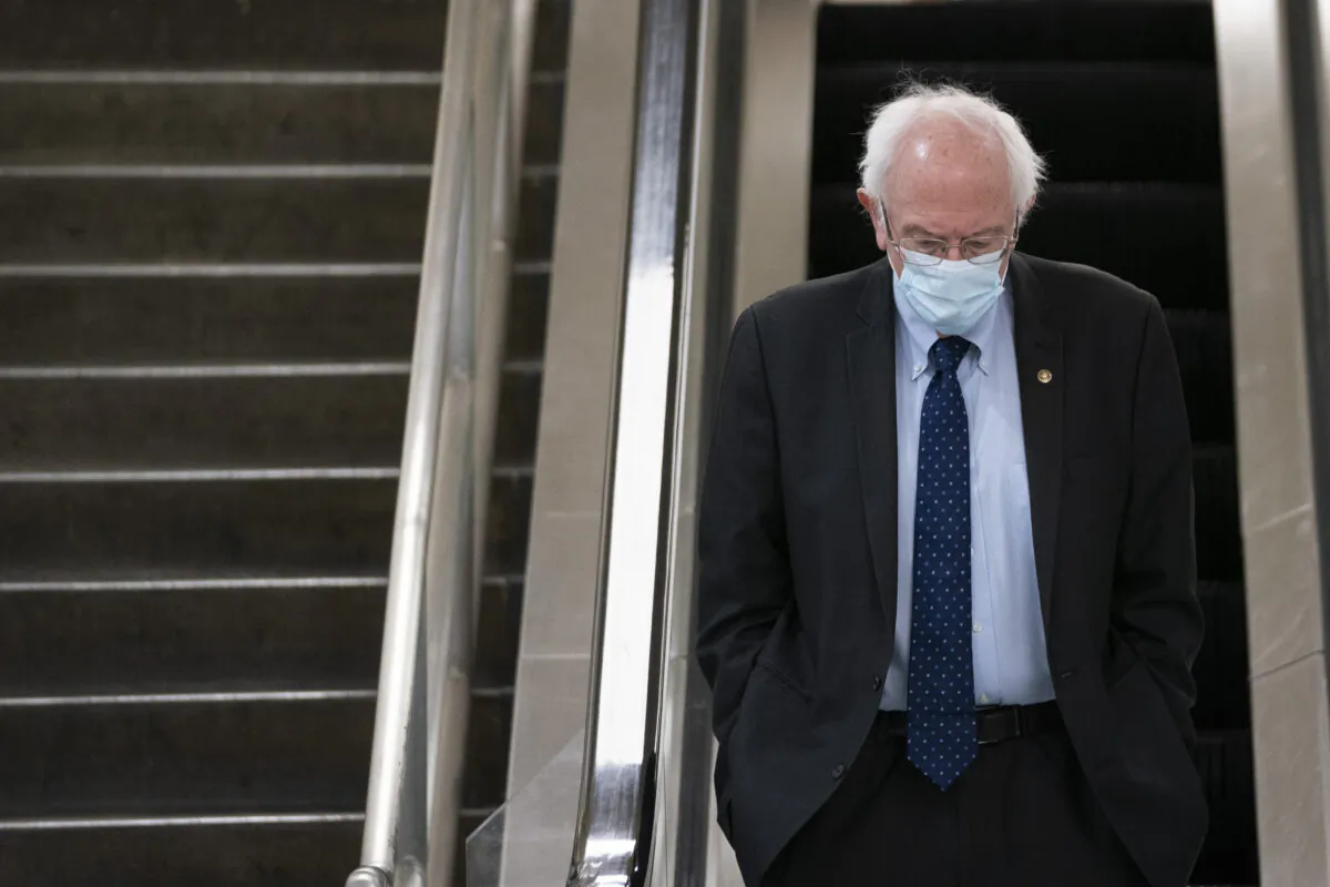 Sen. Bernie Sanders (I-Vt.) walks on Capitol Hill in Washington on Feb. 2, 2021. (Drew Angerer/Getty Images)
