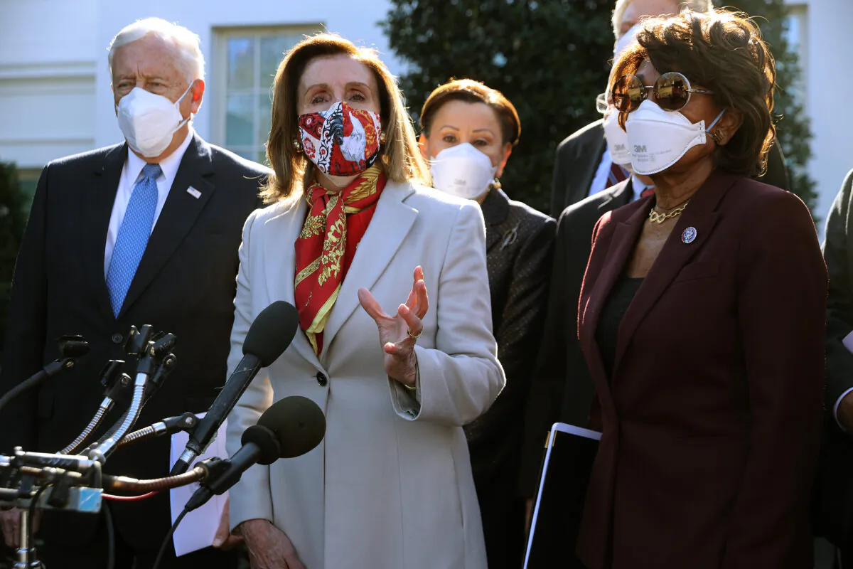 House Speaker Nancy Pelosi (D-Calif.) speaks to reporters, as Reps. Steny Hoyer (D-Md.), left, Nydia Velazquez (D-N.Y.), and Maxine Waters (D-Calif.) listen, outside the White House in Washington on Feb. 5, 2021. (Chip Somodevilla/Getty Images)