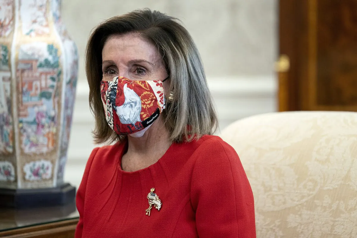 House Speaker Nancy Pelosi and other lawmakers meet with President Joe Biden in the Oval Office of the White House in Washington on Feb. 5, 2021. (Stefani Reynolds/Pool/Getty Images)