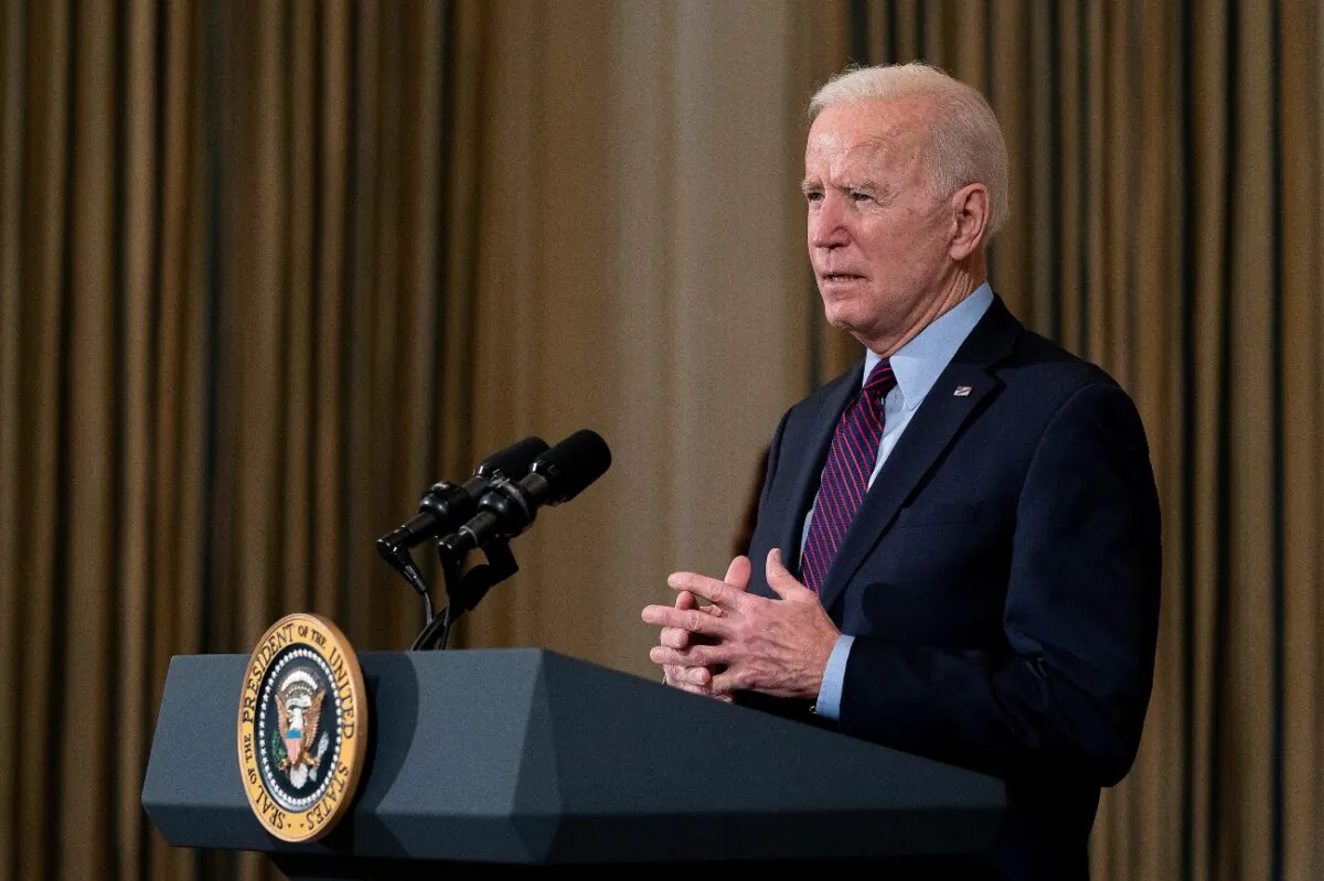 President Joe Biden delivers remarks on the national economy and the need for his administration's proposed $1.9 trillion coronavirus relief legislation in the State Dining Room at the White House in Washington, on Feb. 5, 2021. (Stefani Reynolds/Pool/Getty Images)