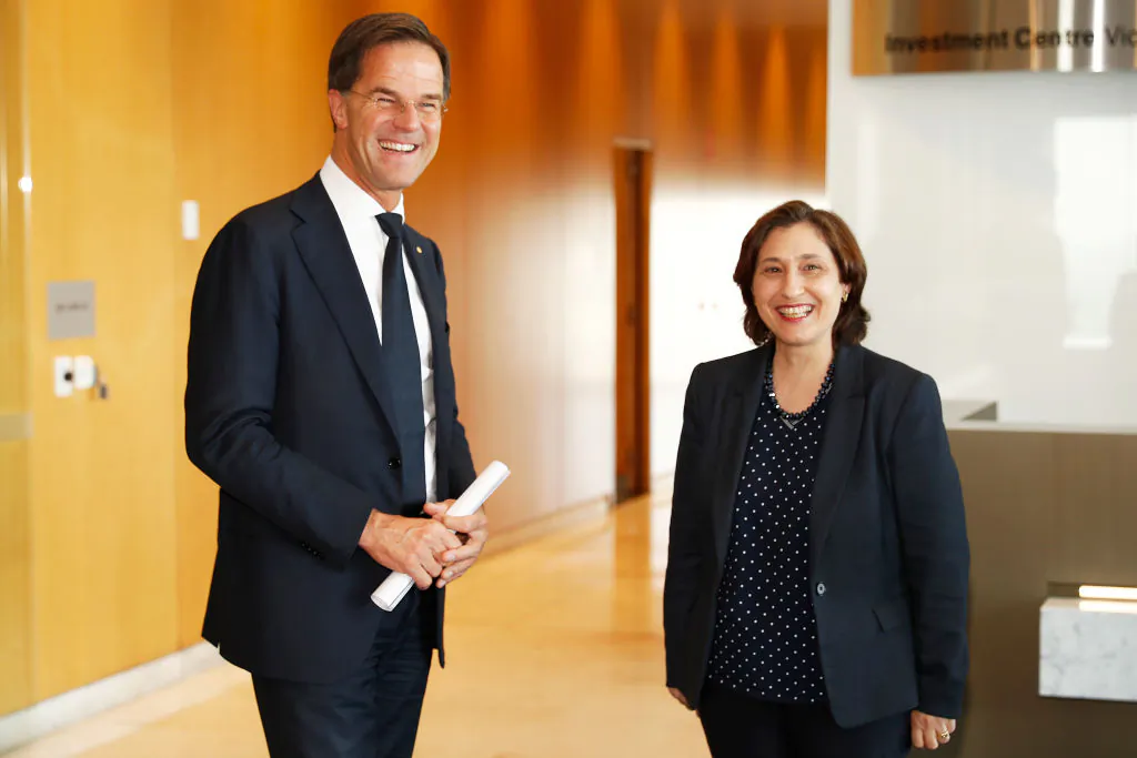 Prime Minister Mark Rutte of the Netherlands speaks with Lily D'Ambrosio, Minister for Energy, during the Forum on Circular Economy at the Investment Centre Victoria on October 11, 2019 in Melbourne, Australia. (Daniel Pockett/Getty Images)
