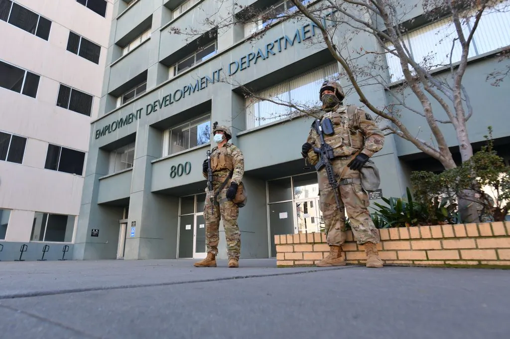 Members of the National Guard protect an Employment Development Department building near the State Capitol in Sacramento, Calif., on Jan. 17, 2021. (Josh Edelson/AFP via Getty Images)