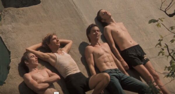 four teen boys sunning