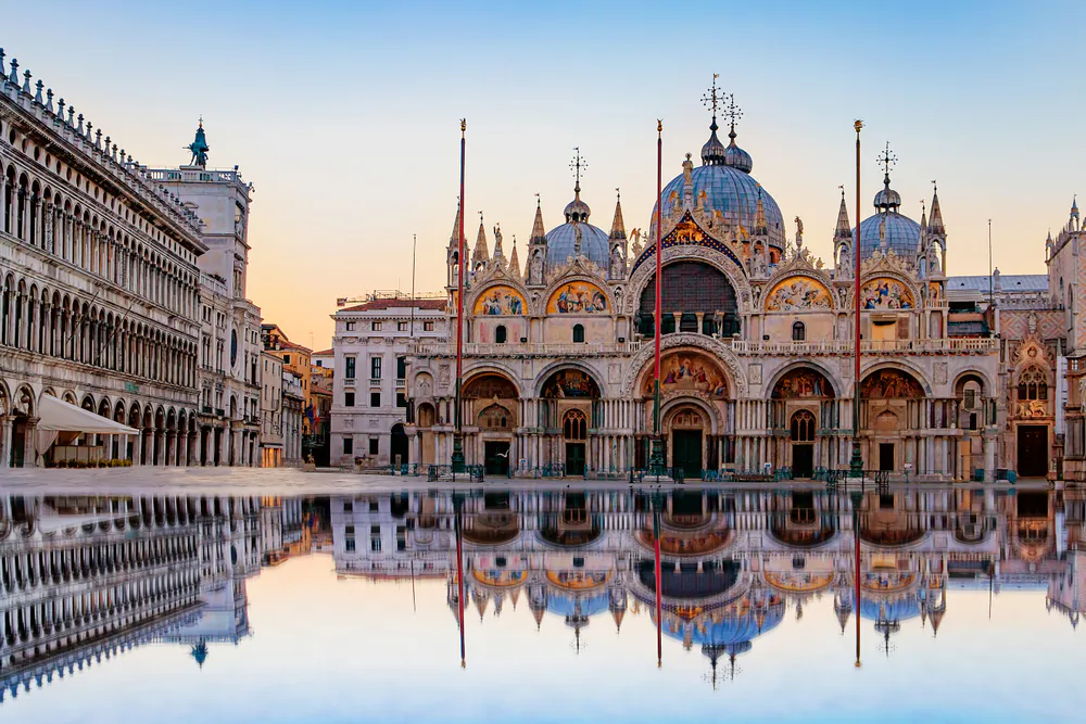 St. Mark’s Basilica and its reflection in the flooded St. Mark’s Square, in Venice, Italy. (Irina Demenkova/Shutterstock.com)