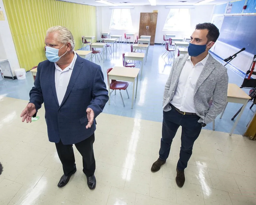 Ontario Premier Doug Ford and Education Minister Stephen Lecce take a tour of Kensington Community School on Sept. 1, 2020.  (Carlos Osorio/The Canadian Press)