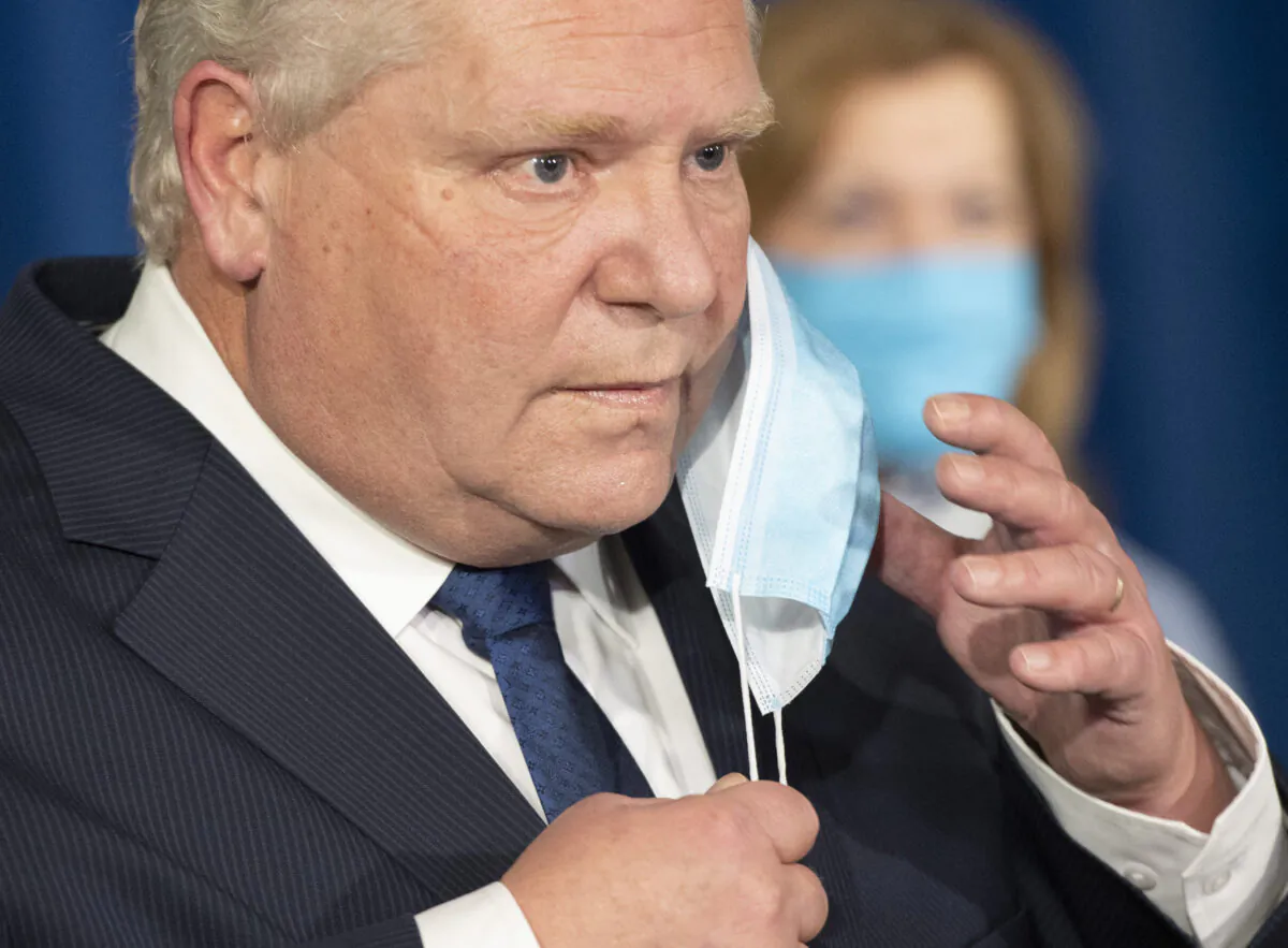 Ontario Premier Doug Ford prepares to speak at Queen’s Park in Toronto on  Jan. 12, 2021. (Frank Gunn/The Canadian Press)