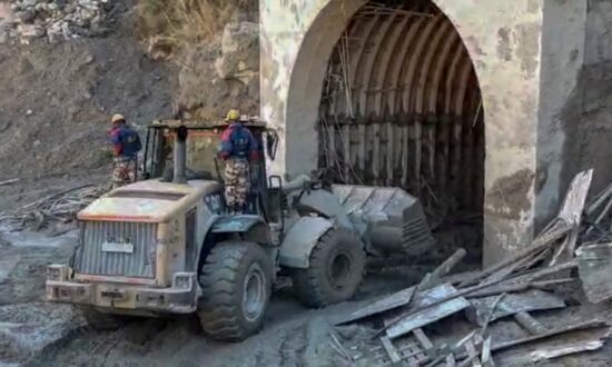 Rescuers in India Digging for 37 Trapped in Glacier Flood