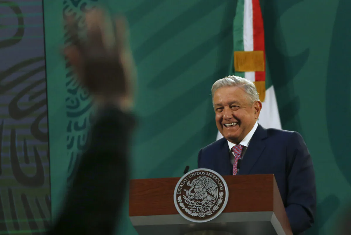 Mexican President Andrés Manuel López Obrador gives his daily morning press conference at the presidential palace, Palacio Nacional in Mexico City on Feb. 8, 2021. (Marco Ugarte/AP Photo)