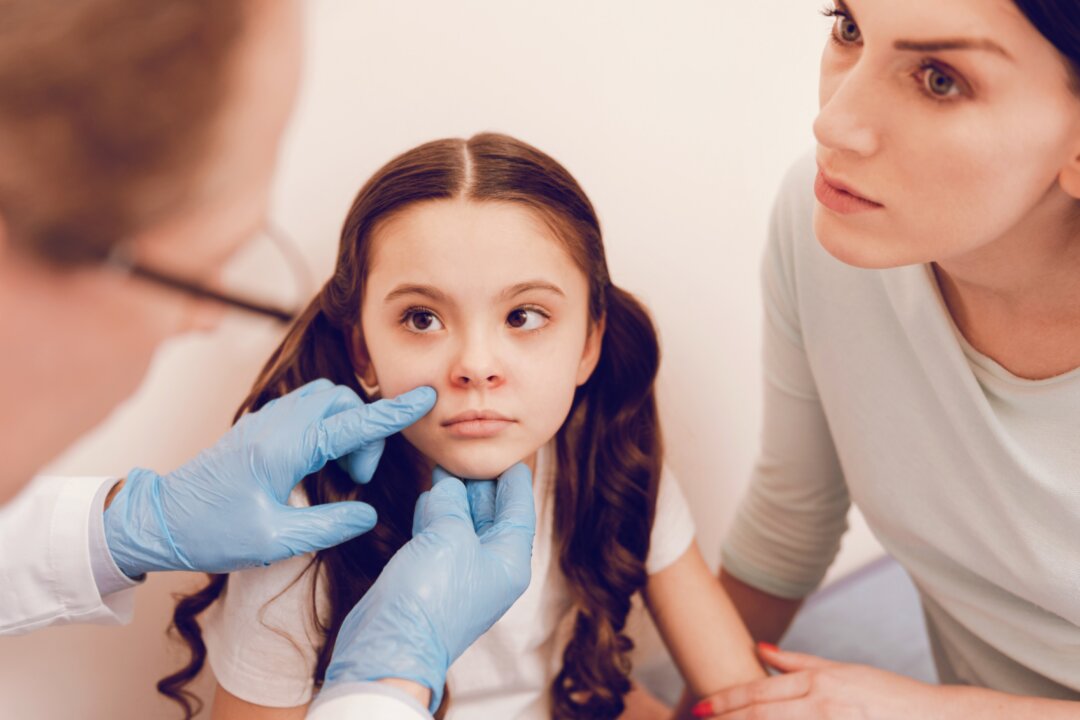 Parents will often ask their children's doctor to prescribe antibiotics without realizing these drugs are often unnecessary and harmful. (YAKOBCHUK VIACHESLAV/Shutterstock)