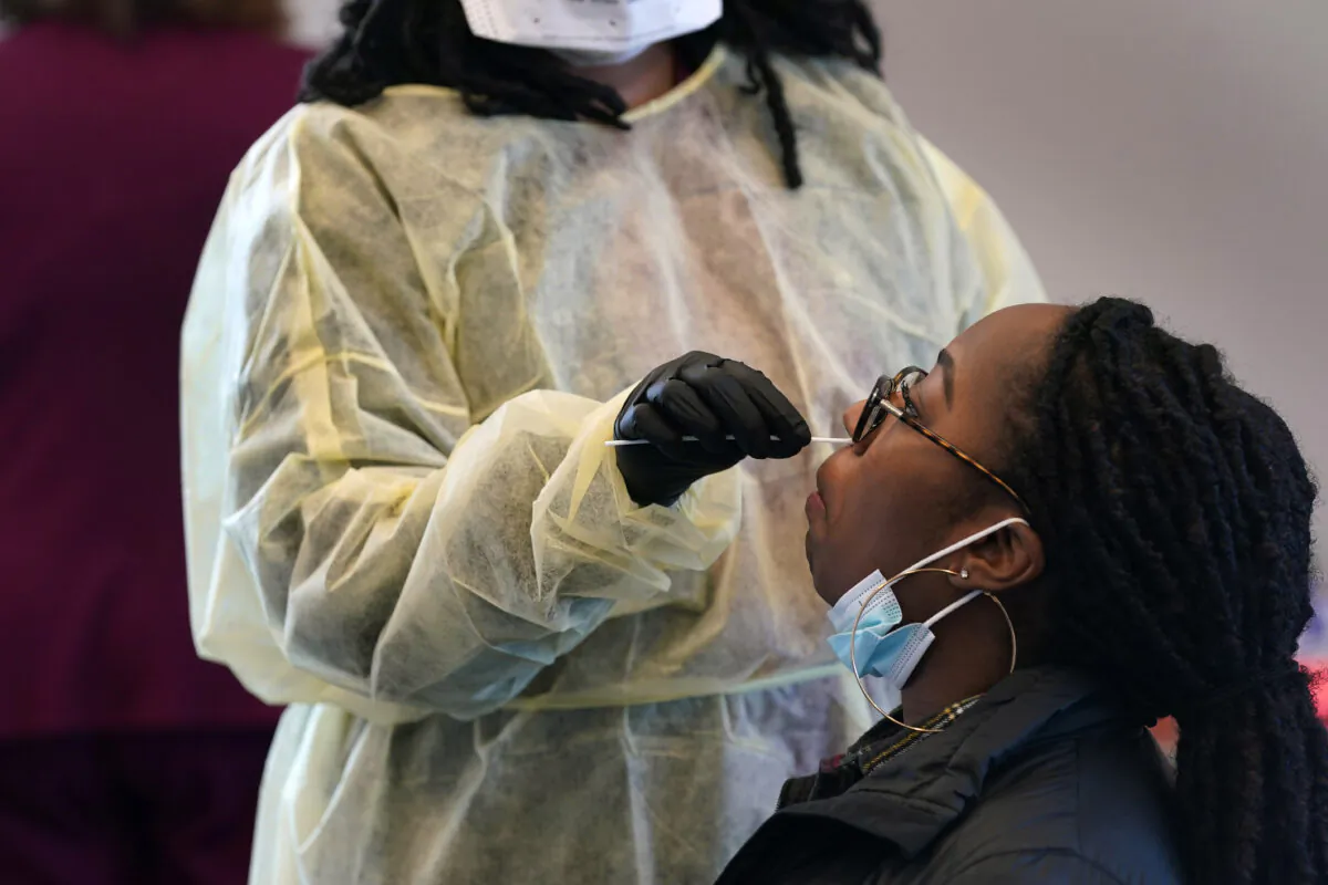 Jazmyn Finney is administered a CCP virus 15-minute rapid test at the student health center on campus at North Carolina Agricultural and Technical State University in Greensboro, N.C., on Feb. 3, 2021. (Gerry Broome/AP Photo)
