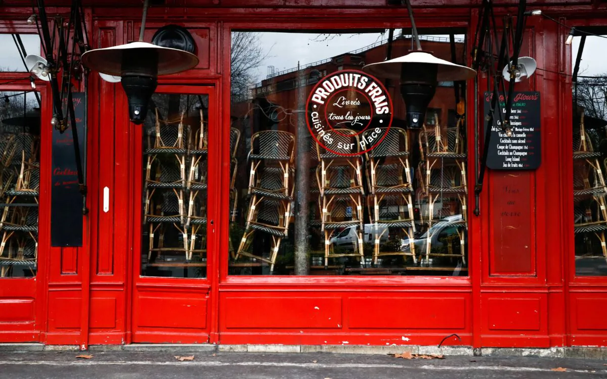 A view shows chairs stacked inside a closed restaurant in Paris as the French government keeps bars and restaurants closed as part of COVID-19 restrictions measures to fight the coronavirus disease outbreak in France, on Jan. 5, 2021. (Gonzalo Fuentes/Reuters)