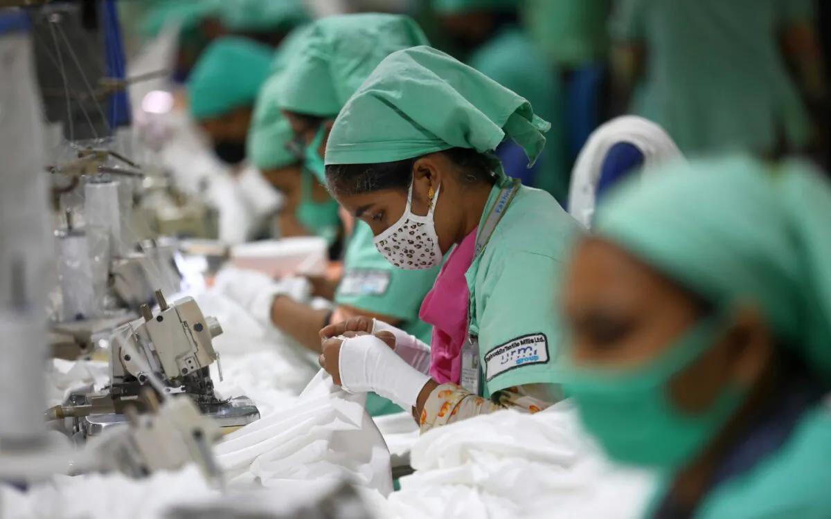 Garment employees work in a sewing section of the Fakhruddin Textile Mills Limited in Gazipur, Bangladesh, on Feb. 7, 2021. (Mohammad Ponir Hossain/Reuters