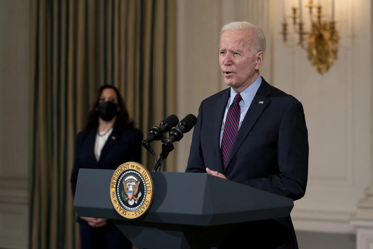 President Joe Biden delivers remarks on the national economy and the need for his administration's proposed $1.9 trillion CCP virus relief legislation with Vice President Kamala Harris in the State Dining Room at the White House in Washington on Feb. 5, 2021. (Stefani Reynolds-Pool/Getty Images)