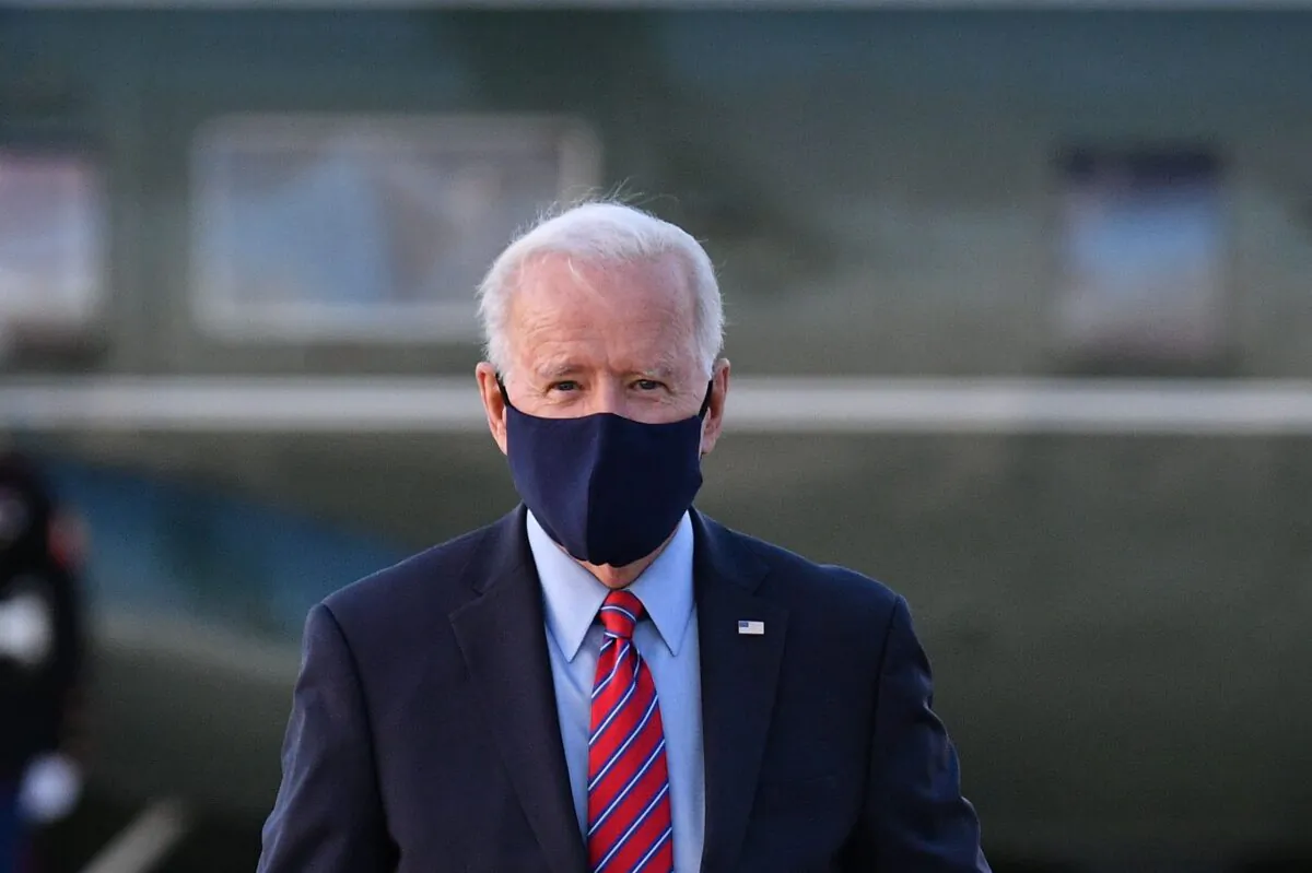 President Joe Biden makes his way to board Air Force One before departing from Andrews Air Force Base in Maryland on Feb. 5, 2021. (Mandel Ngan/AFP via Getty Images)