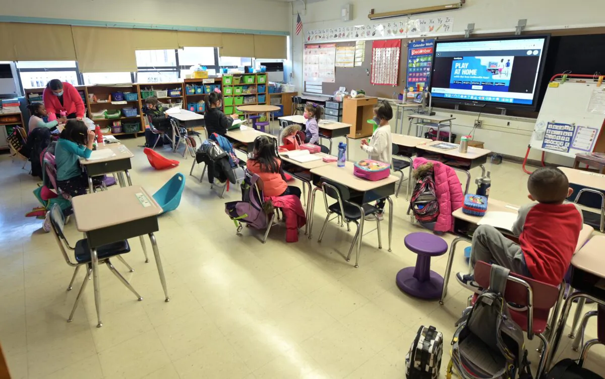 A teacher at Yung Wing School P.S. 124 teaches blended learning students in New York City on Dec. 7, 2020. (Michael Loccisano/Getty Images)