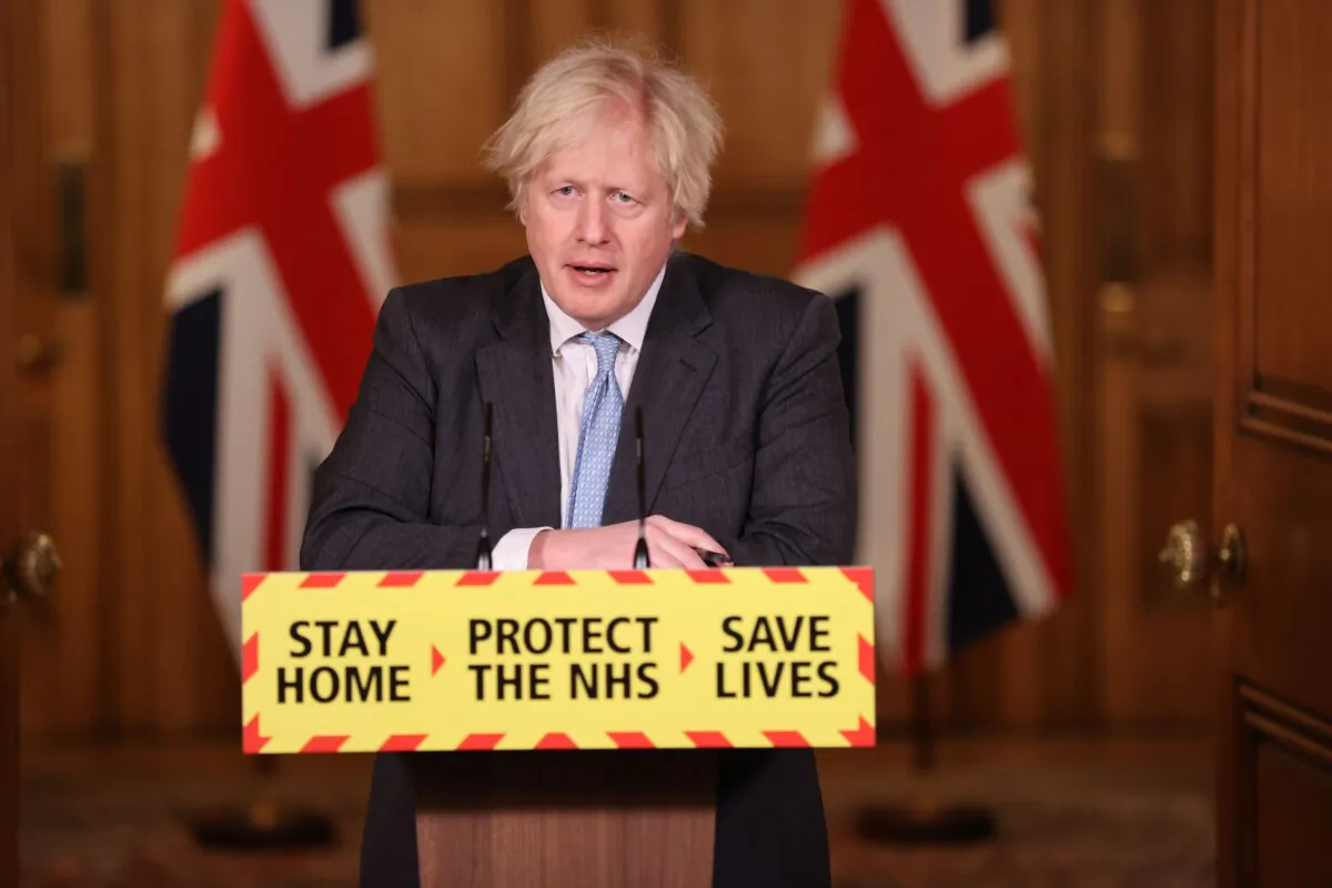 Britain's Prime Minister Boris Johnson speaks during a virtual press conference inside 10 Downing Street in central London, on Feb. 10, 2021. (Steve Reigate/POOL/AFP via Getty Images)
