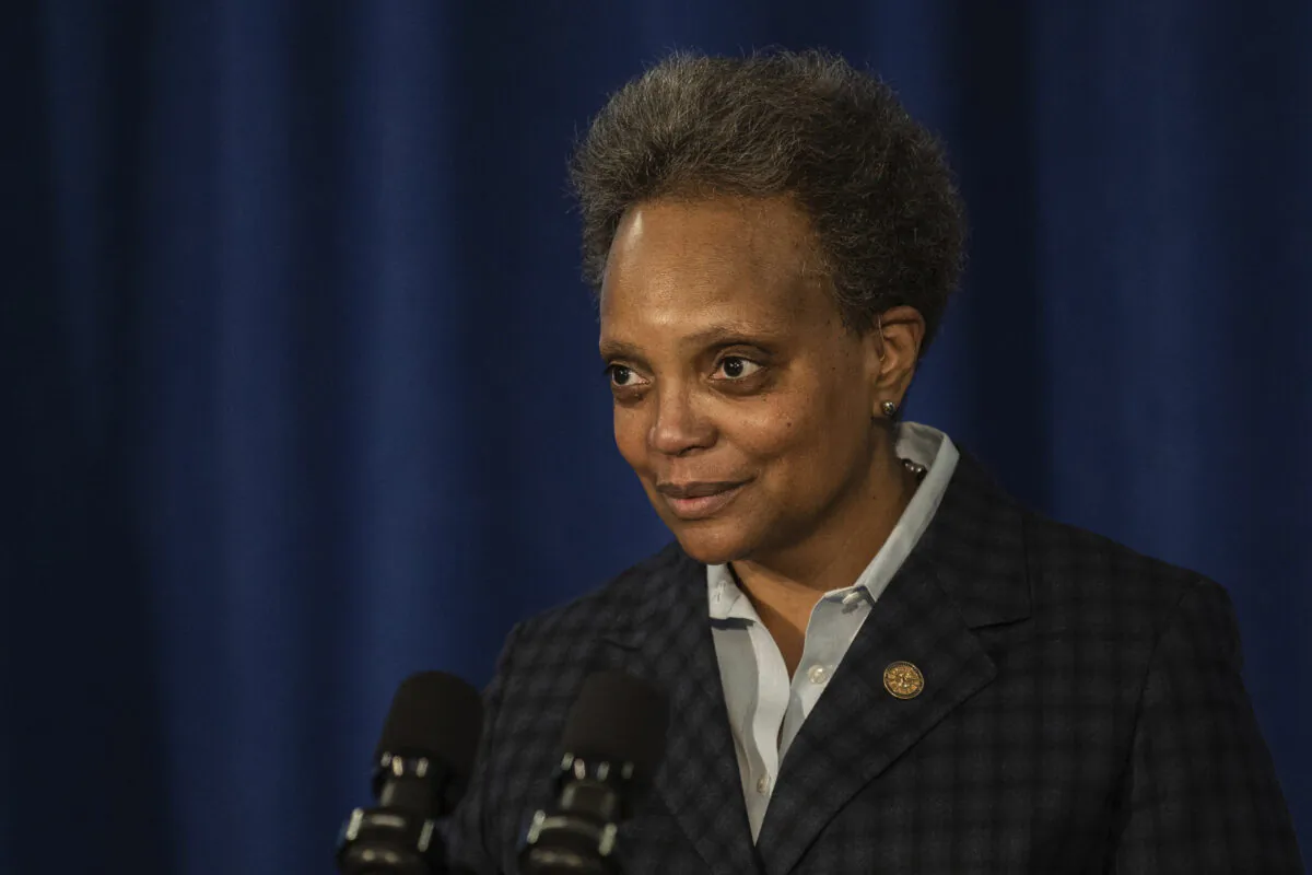 Chicago Mayor Lori Lightfoot demands the Chicago Teachers Union to reach a deal with Chicago Public Schools on a reopening plan during a press conference at City Hall, Chicago, Ill., on Feb. 4, 2021. (Pat Nabong/Chicago Sun-Times via AP)